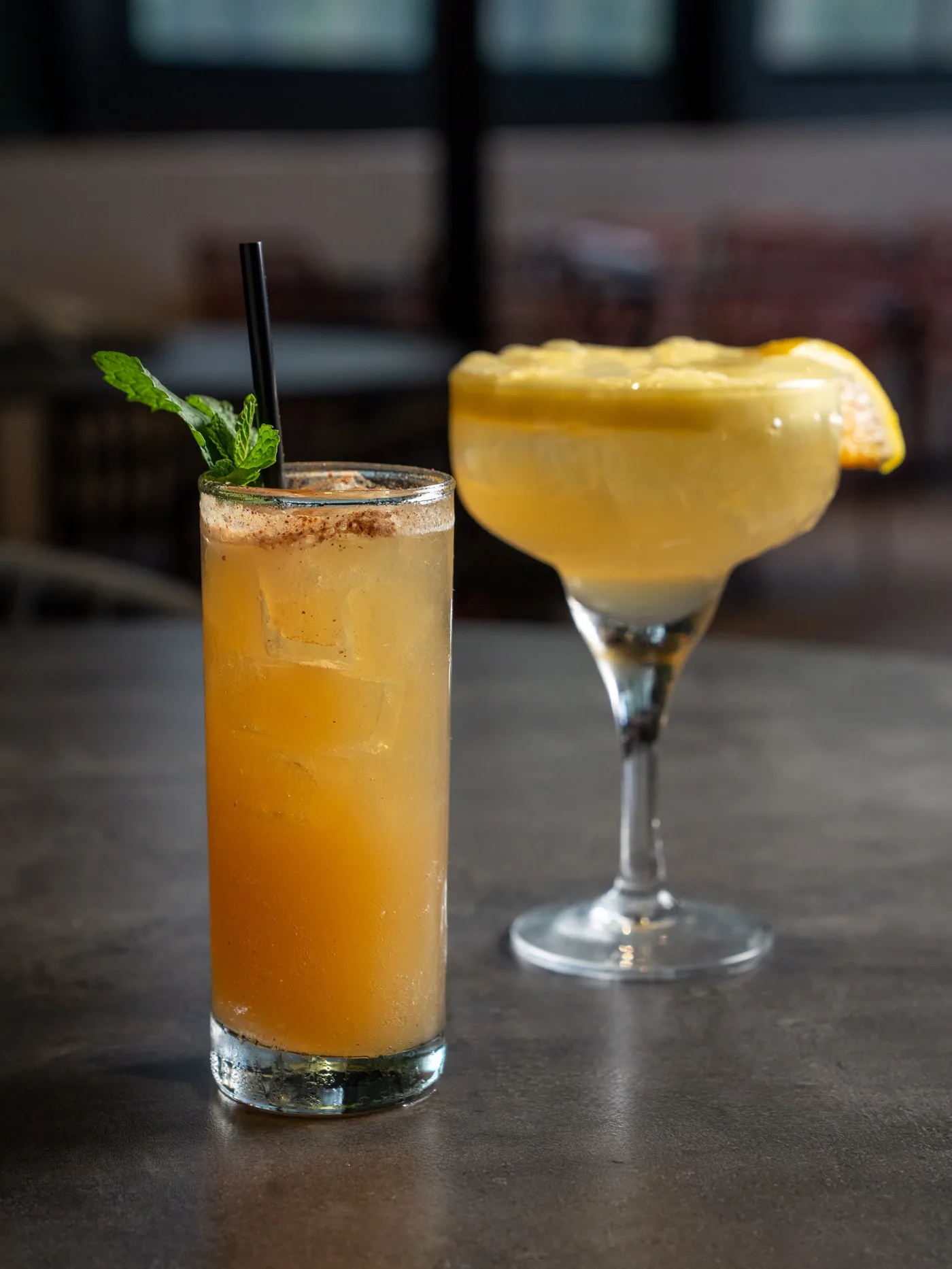 Two cocktails on the bar